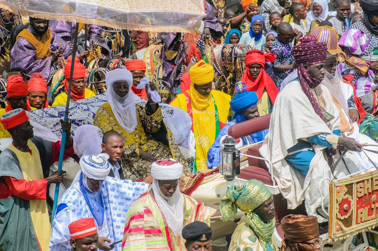 Titled elders, drummers and families of Ilorin gathered shoulder to shoulder along a Durbar procession route.